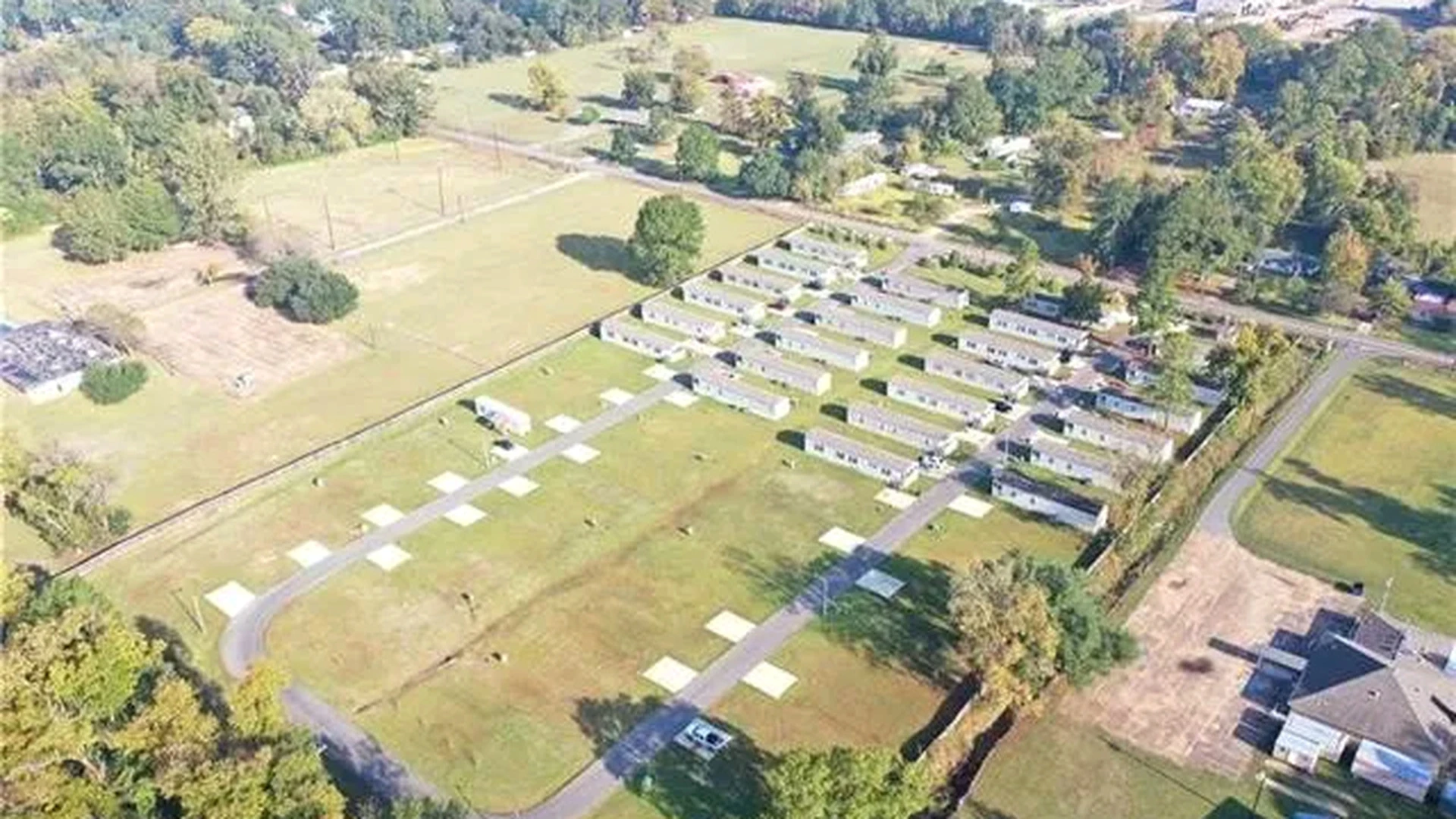 Earlier aerial photograph of Sweet Meadow RV Park showing property roads and RV pad areas